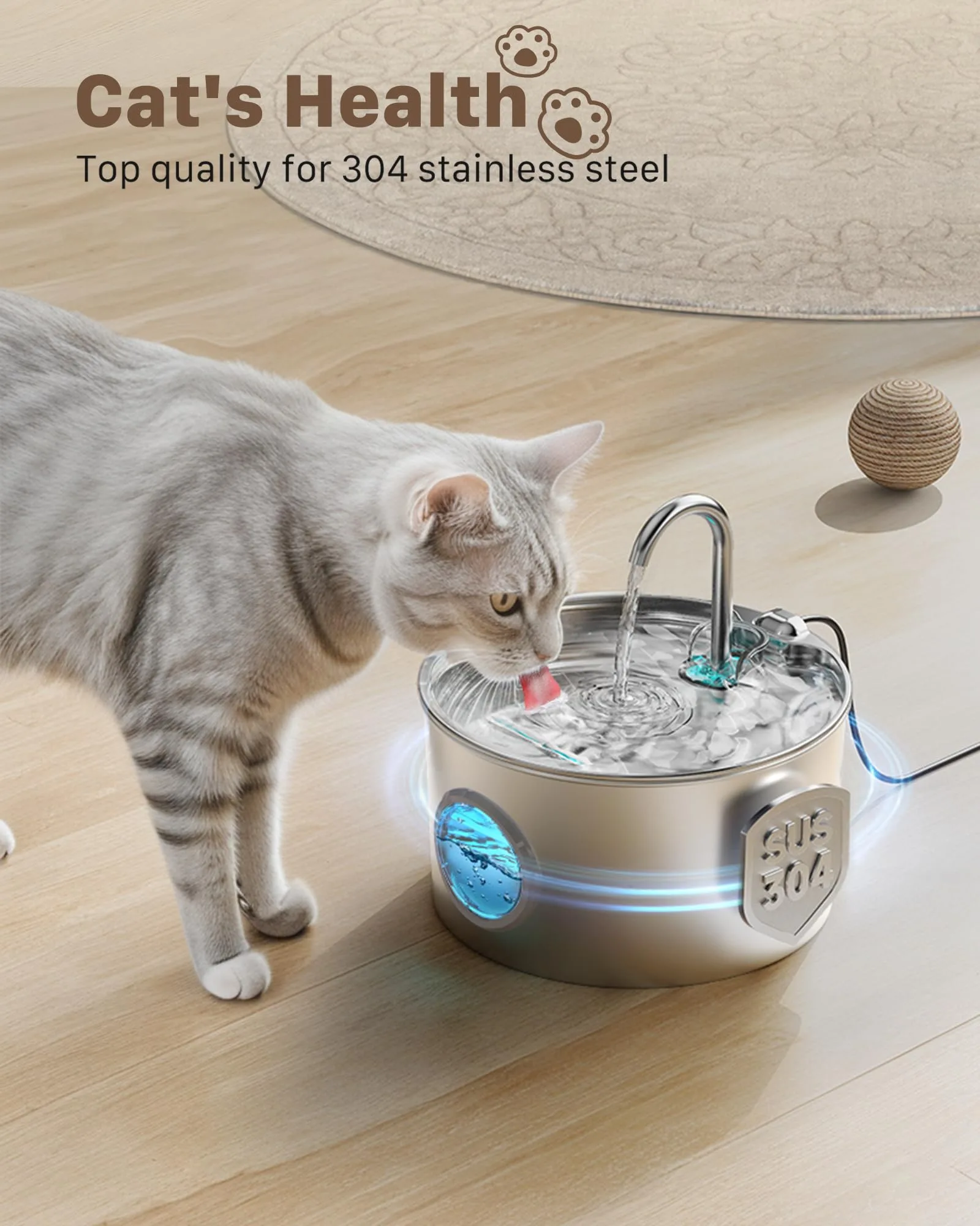 The GIOTOHUN Stainless Steel Cat Fountain in a modern kitchen setting. Water flows clearly from the curved faucet spout into the steel basin. The unit looks sleek and clean.
