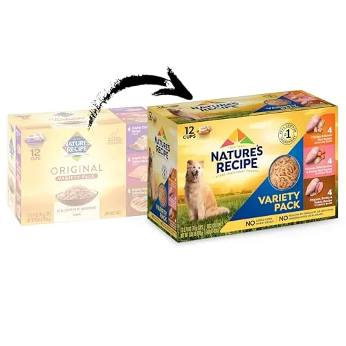 A close-up shot of an open cup, showing tender pieces of chicken and carrots floating in a clear, appetizing broth.