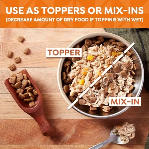 My dog Sam, a golden retriever, happily licking his bowl clean with an empty food cup beside it.