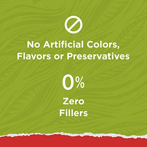 Macro photography showing the natural brown kibble pieces with varied shapes but uniform coloration, contrasting with artificially colored kibble samples.